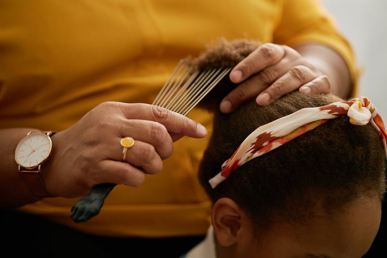 Close up of hands styling hair