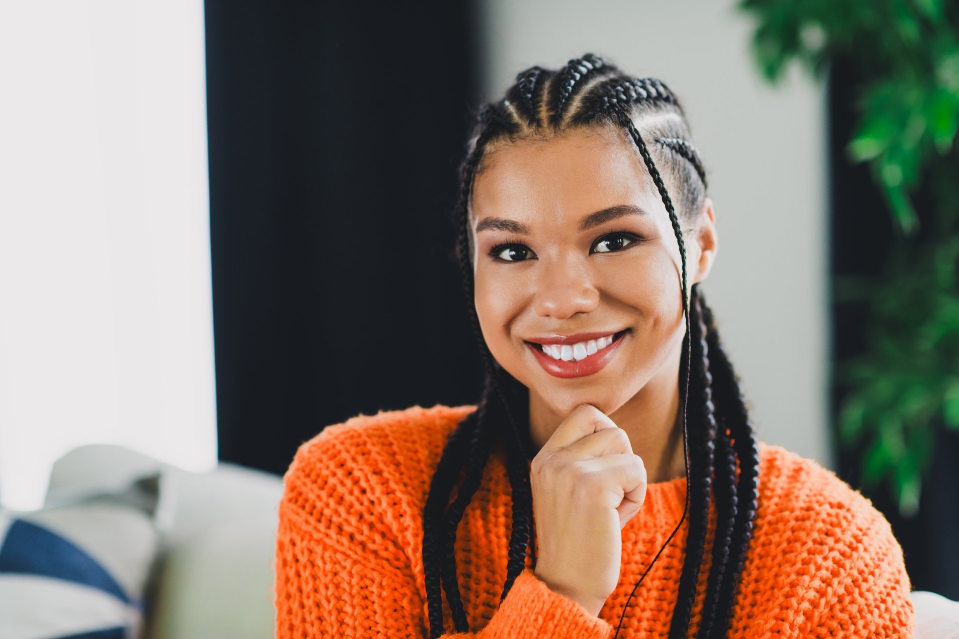 Stylish woman with braided hair